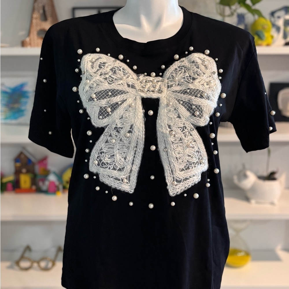 Elegant Black Top with White Lace Bow